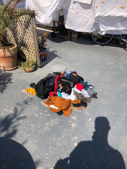 A pile of our clothes on the rooftop terrace. 