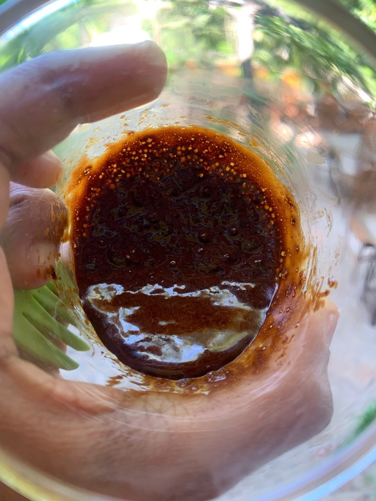 ingredients mixed together and in a clear glass